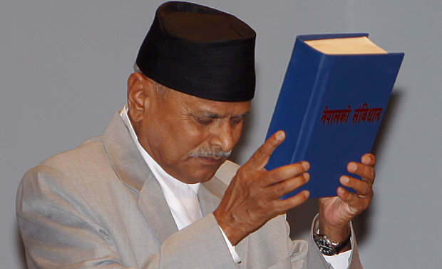 Nepalese President Ram Baran Yadav displays the constitution, formally adopted following a decade of political infighting, in Kathmandu, Nepal (Photo: AP) Nepalese President Ram Baran Yadav displays the constitution, formally adopted following a decade of political infighting, in Kathmandu, Nepal (Photo: AP)